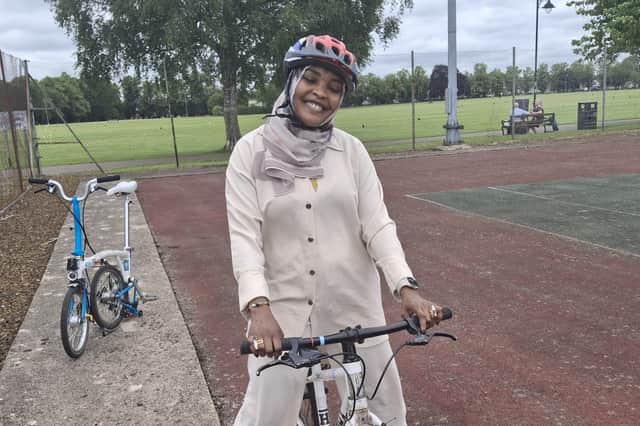 A participant enjoying learning to ride