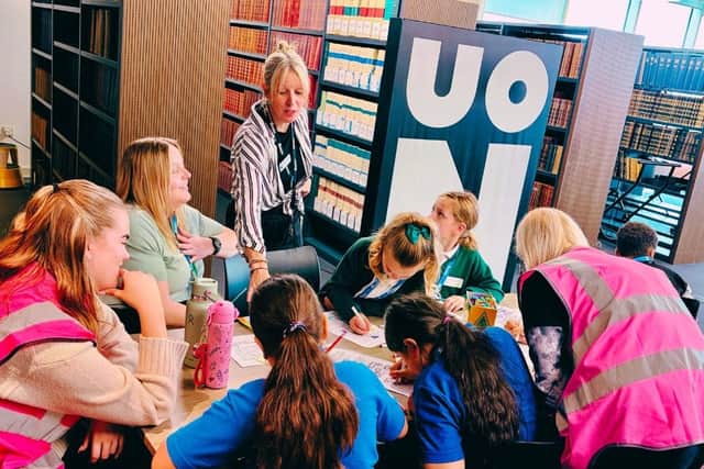 UON's Dr Laura-Jane Devanny, Senior Lecturer in Education (standing) oversees poetry challenge at the Big50 Book Festival.