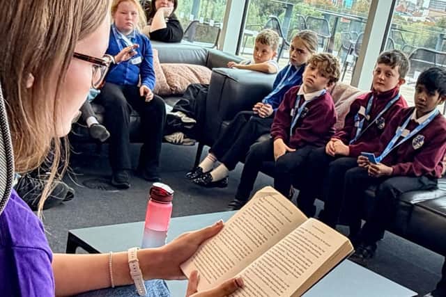 UON student teacher reads a passage from her favourite book to inspire young readers.