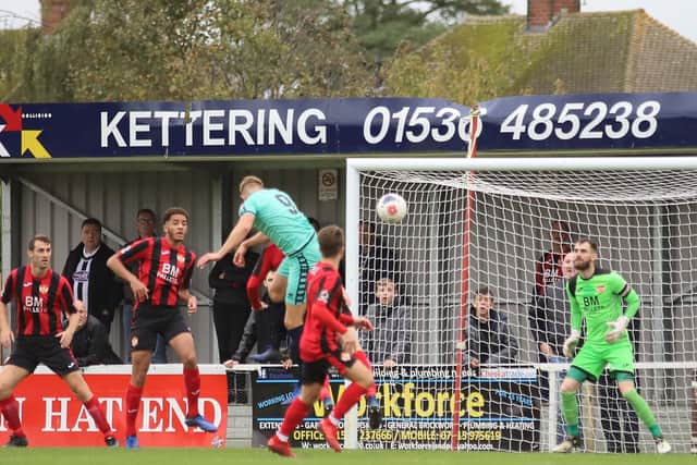 Glen Taylor heads home the first of his two goals for Spennymoor at Latimer Park