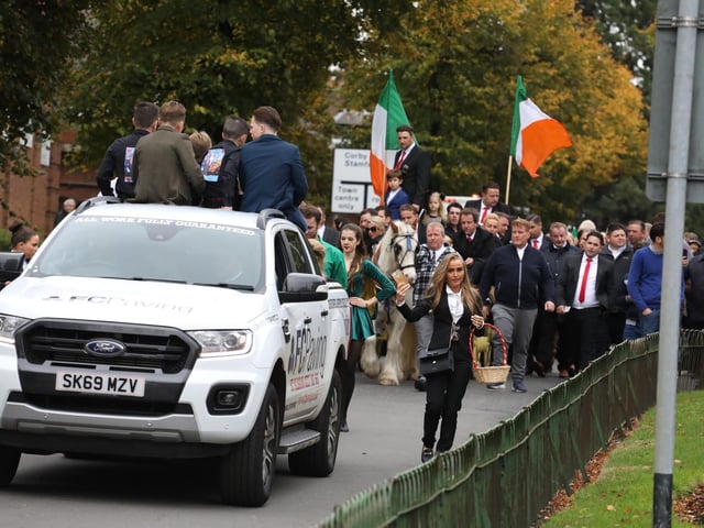 There were many mourners sat with Chap's coffin on the traditional four-wheeler wagon