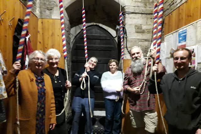 Tower Captain Cathy Mason (on left) with bell ringers at St John the Baptist Church, Corby