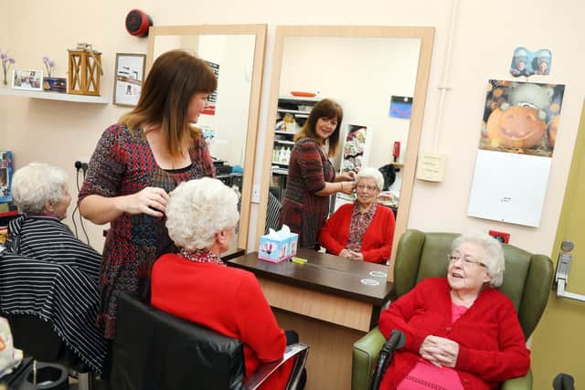 Hairdresser Gillian Lamb says the centre is more like a family than a place of work. Pic Alison Bagley.