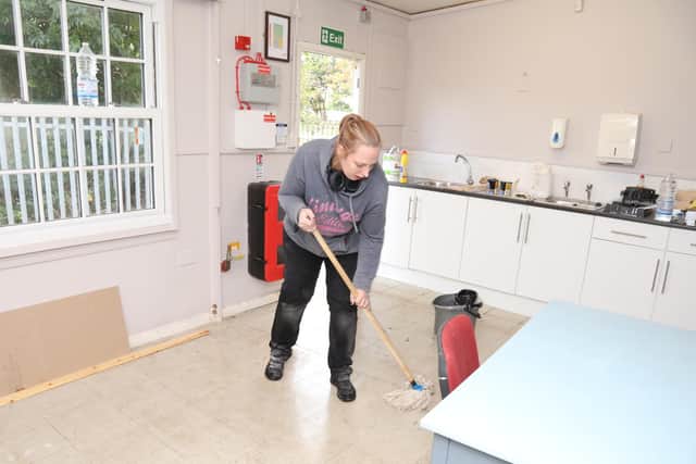 Mopping the floor ready for the first guests