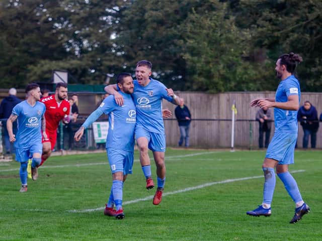Jordon Crawford and Steve Diggin celebrate one of Corby Town's goals in last weekend's 3-0 win at North Leigh. Picture by Jim Darrah
