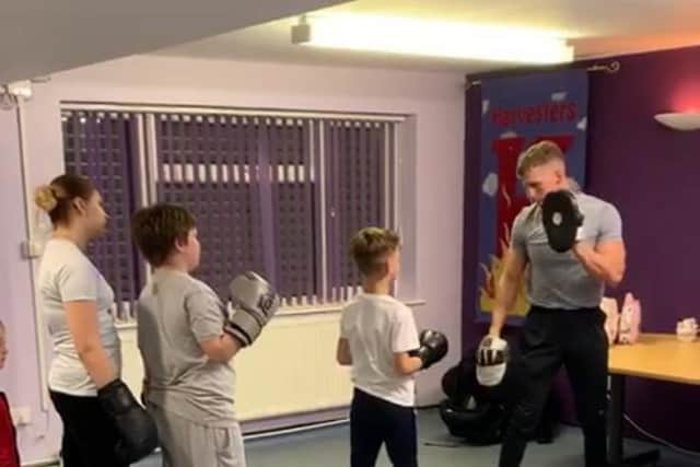 Adam structures the classes like a circuit, with children moving around different stations to practice different skills