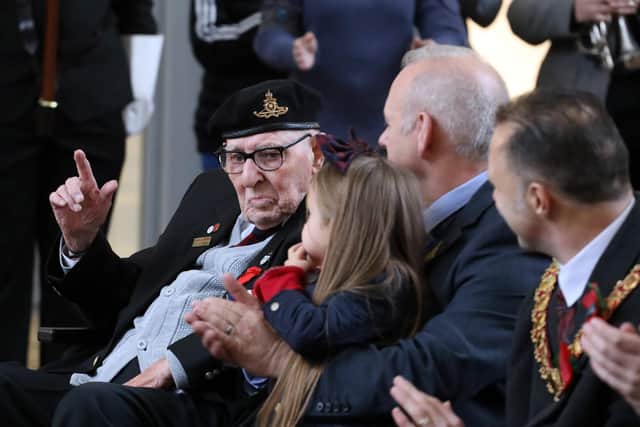 Jim Wigfield, Normandy veteran acknowledges the crowd