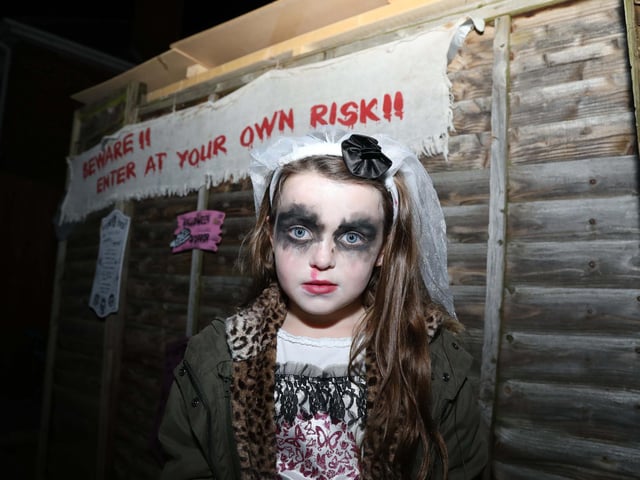 This young trick or treater might have scared off some of the creepy characters in the House of Horrors with her Halloween costume!