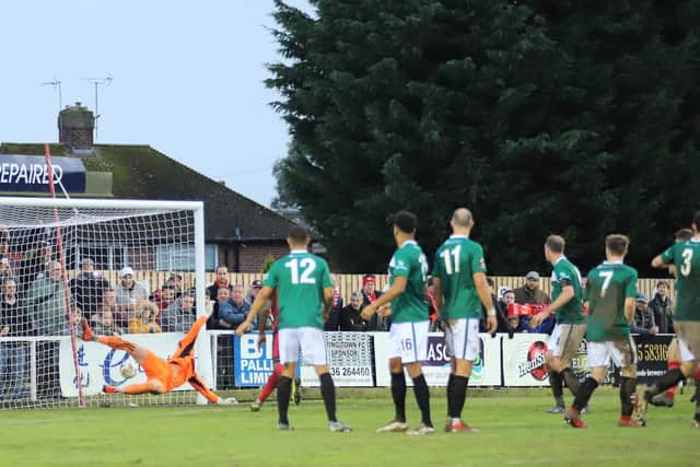 Ben Milnes' free-kick finds the bottom corner to make it 3-0