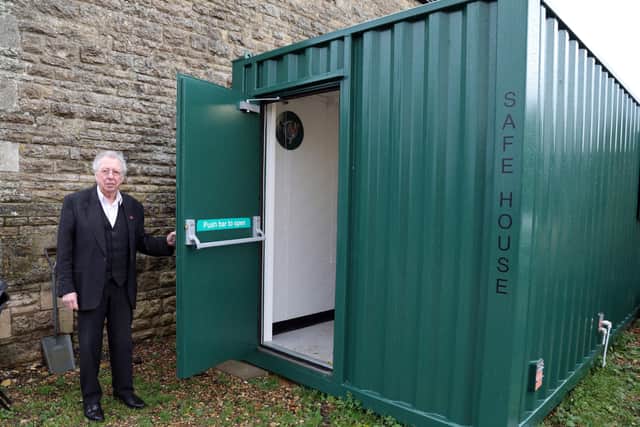 Tom Butler with his prototype safe house