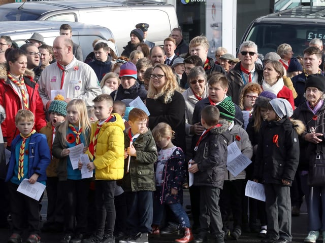 Younger members of the town's Girl Guides and Scouts