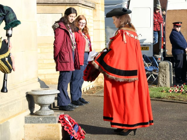 Mayor of Wellingborough Cllr Jo Beirne places a wreath