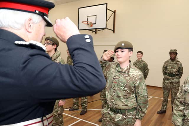 Lord Lieutenant David Laing salutes the cadets