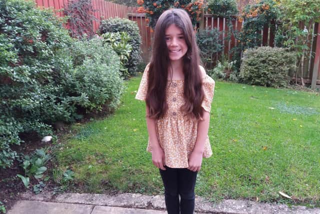Kiera has always had long hair, seen here before her haircut