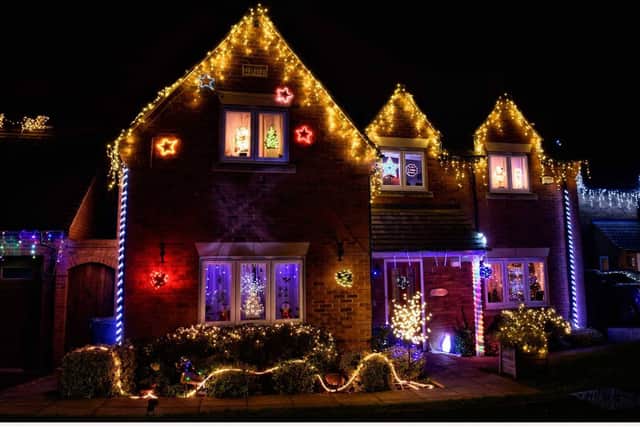 Every house in Hollow Wood Road puts up a display. Picture by John Woods.