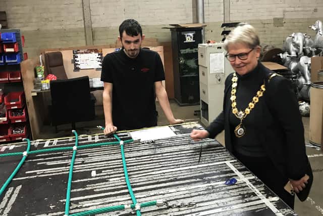 Mayor of Kettering Cllr Keli Watts views the production process at Wicksteed Playgrounds.