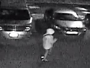 Police are appealing for information about who this person may be, who was seen near the nearby Well Cafe five minutes before the murder.