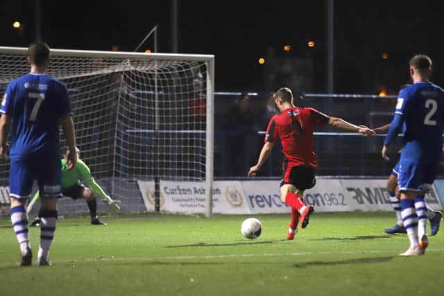 Loan signing Matthew Taylor gets in for a shot on goal during the Poppies' goalless draw at Curzon Ashton