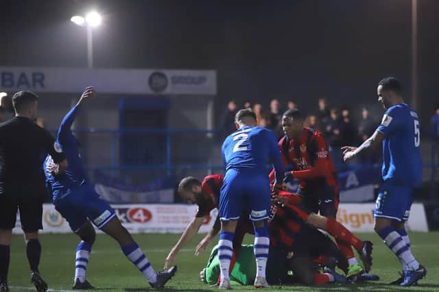 Match action from the Poppies' draw at Curzon Ashton