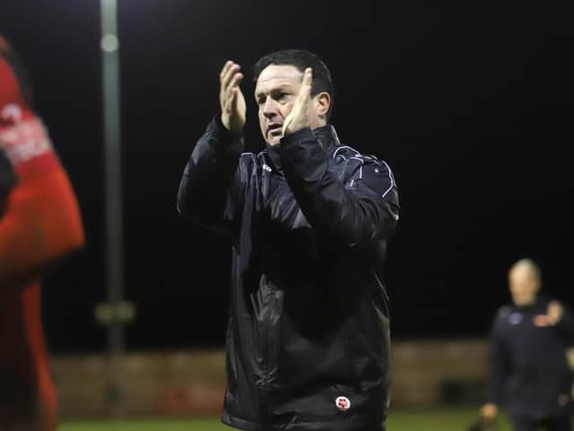 Paul Cox applauds the Kettering Town fans after the goalless draw with York City. Picture by Peter Short