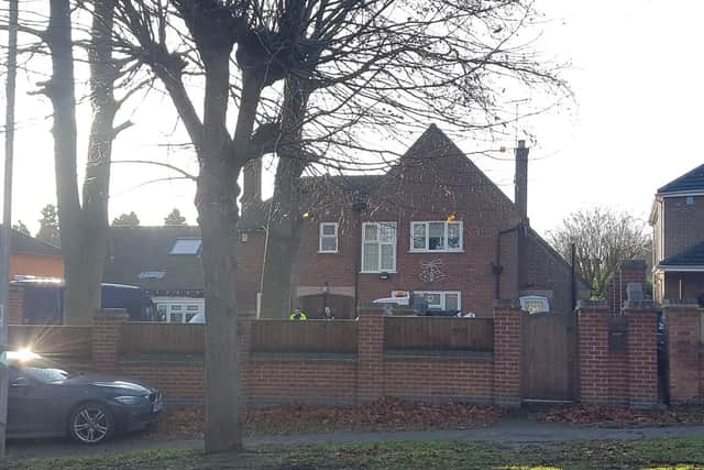 The house is just metres from the murder scene on Wellingborough Road