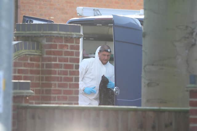 Forensic investigators were seen coming in and out of the house