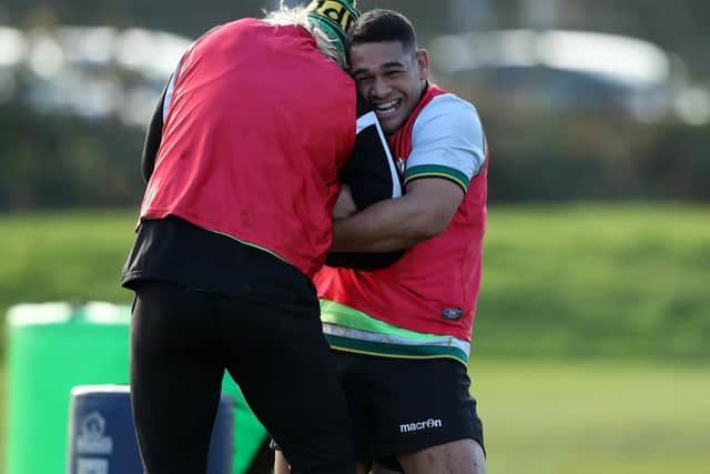 Matavesi enjoys a tussle with Harry Mallinder in training