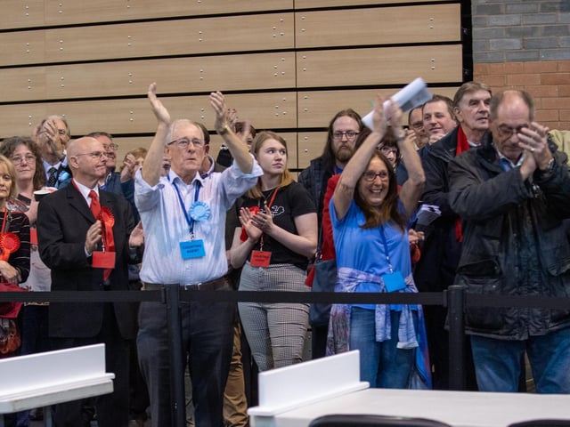 Conservative campaigners celebrate Mr Hollobone's win