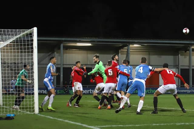 Poppies goalkeeper Paul White came up for a stoppage-time corner as they chased an equaliser