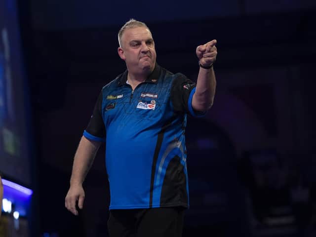 Rushden's James Richardson celebrates during his first-round win over Mikuru Suzuki in the World Darts Championship. Picture courtesy of Lawrence Lustig/PDC