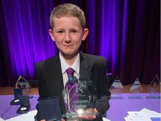 Thomas with his award from KSA