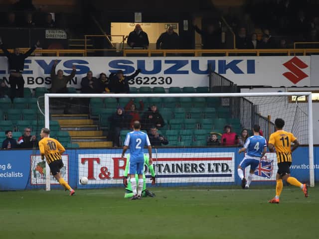 Jake Wright scores Boston United's first goal in Kettering Town's 2-1 defeat at York Street. Pictures by Peter Short