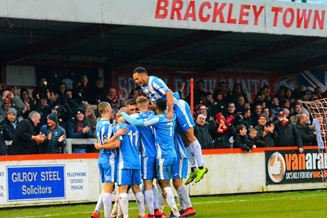 The Kettering Town players celebrate their goal during the 1-1 draw at Brackley Town. Pictures by Eden Palmer