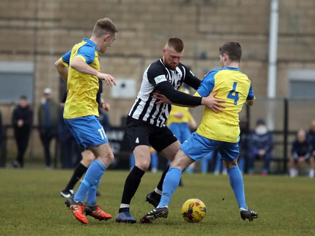 Corby Town midfielder Joe Burgess is available again after a four-match ban
