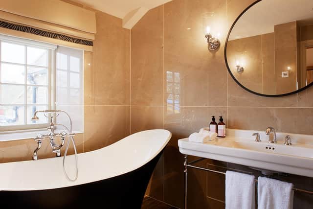 Some rooms will feature a roll-topbathtub, period features, and a palette 'inspired by the surrounding countryside'.