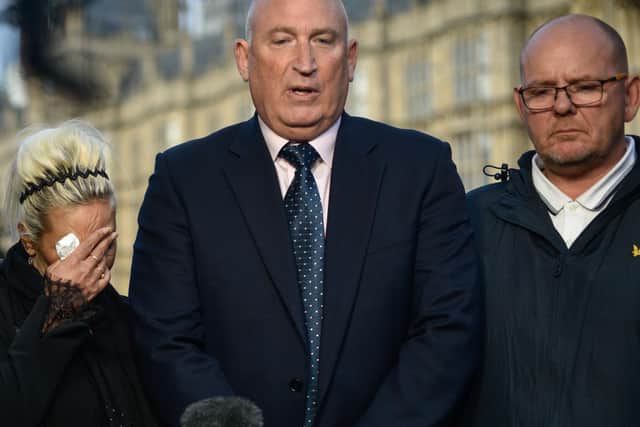 Harry Dunn family spokesman Radd Seiger (centre) with Harry's parents Charlotte Charles and Tim Dunn. Photo: Getty Images
