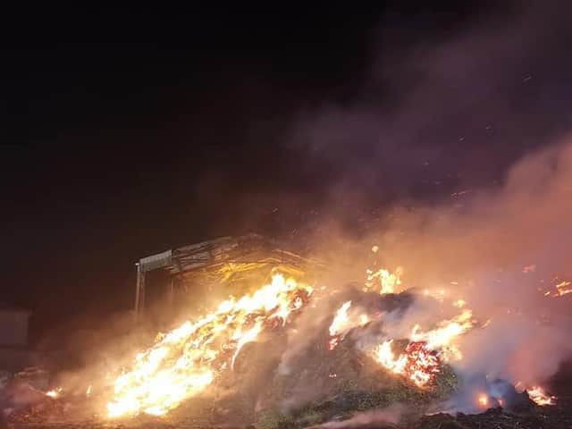 A fire involving 1,000 bales of hay required six fire crews to get it under control