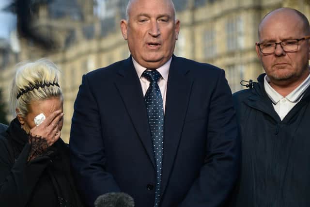 Harry Dunn family spokesman Radd Seiger (centre) with Harry's parents Charlotte Charles and Tim Dunn. Photo: Getty Images