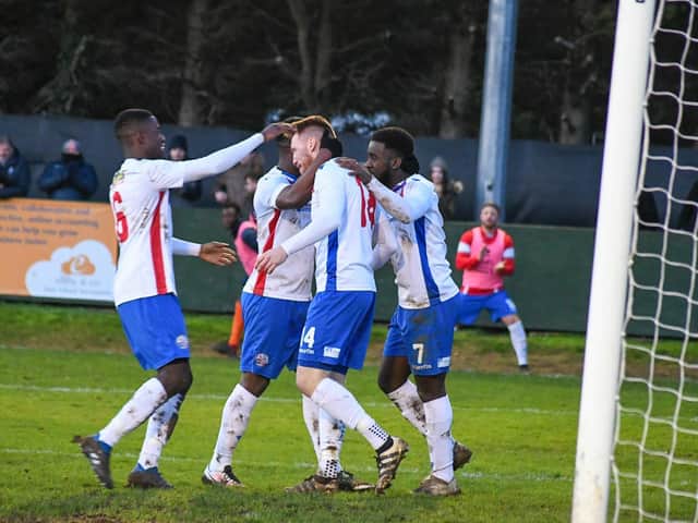 Ben Farrell takes the congratulations after he scored AFC Rushden & Diamonds' fourth goal in their 4-2 victory over Stratford Town. Pictures courtesy of HawkinsImages