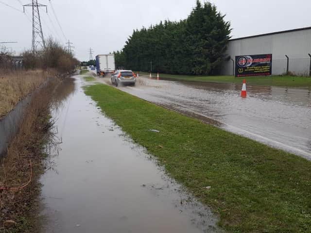 Both footpaths and almost the entire road have been flooded since November