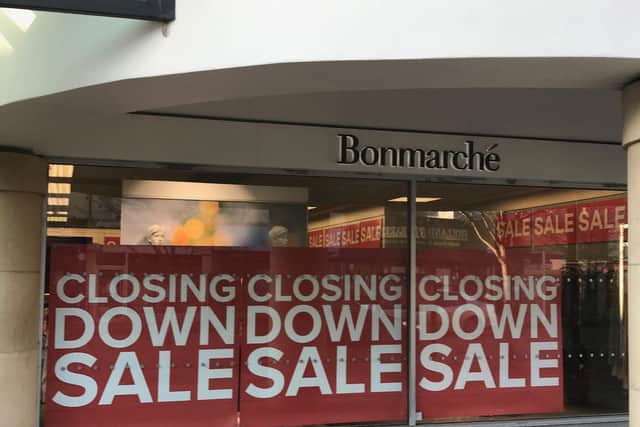 Closing down sale signs like these have gone up in the Wellingborough store