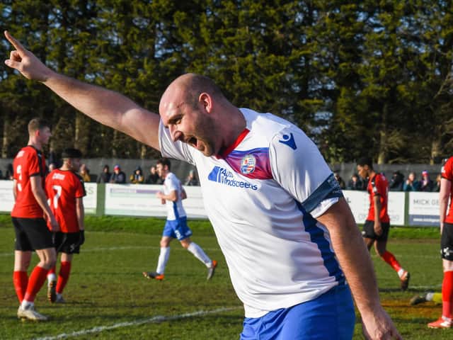 Liam Dolman celebrates after he scored AFC Rushden & Diamonds' second goal in the 3-0 victory over Redditch United. Pictures courtesy of HawkinsImages