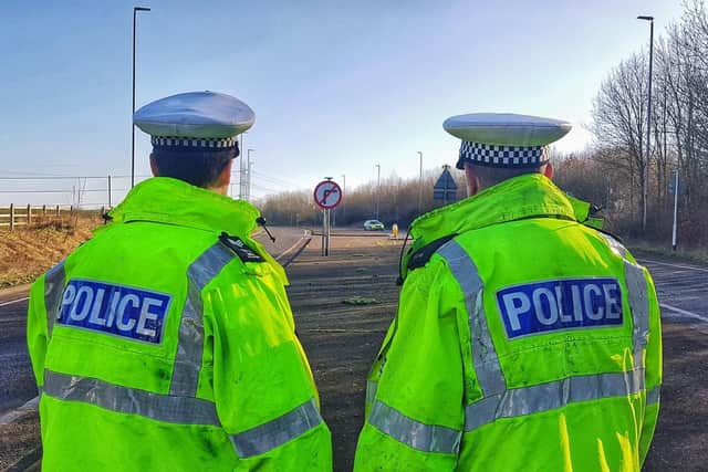 Traffic police at the scene of yesterday's A6 crash.