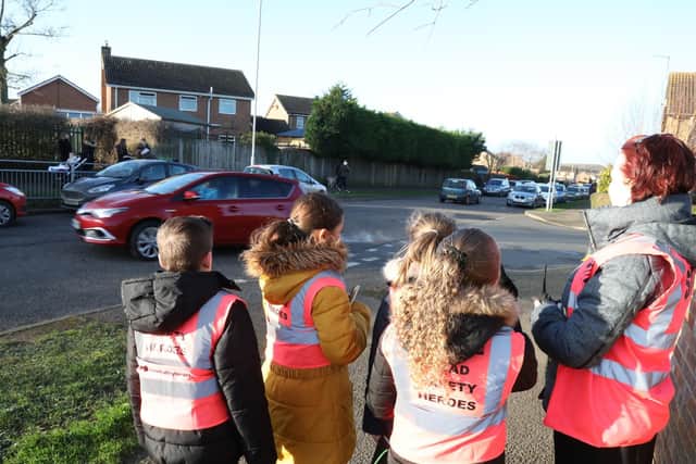 The group make high-visibility patrols in the streets near to the school