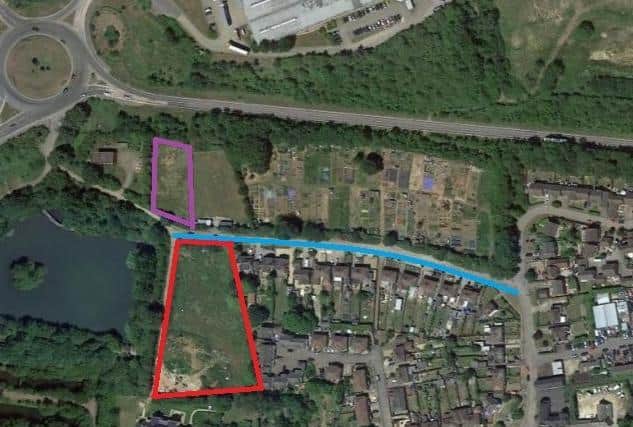 Larratt Road (in blue) with the field outlined in red. The field outlined in purple is also owned by the same person, and locals say they fear that might also be subject to development.