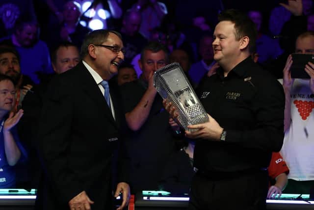 Shaun Murphy, who grew up in Irthlingborough, received the Welsh Open winner's trophy from legend Ray Reardon