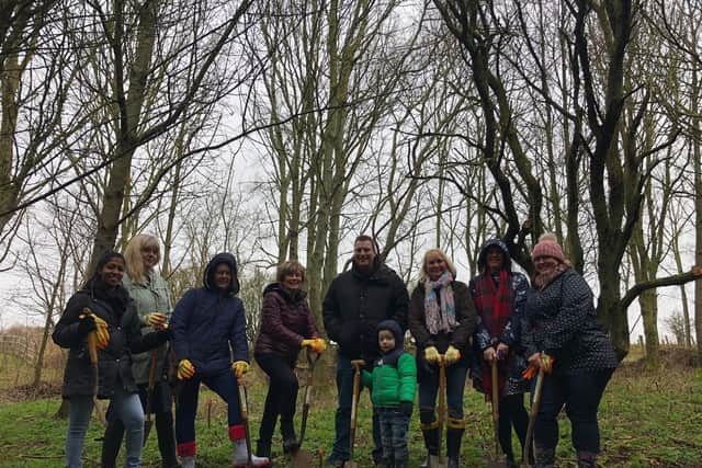Councillor Fiona Baker (fourth from the left), staff from the adoption and fostering team, adopters and foster carers at the tree planting.