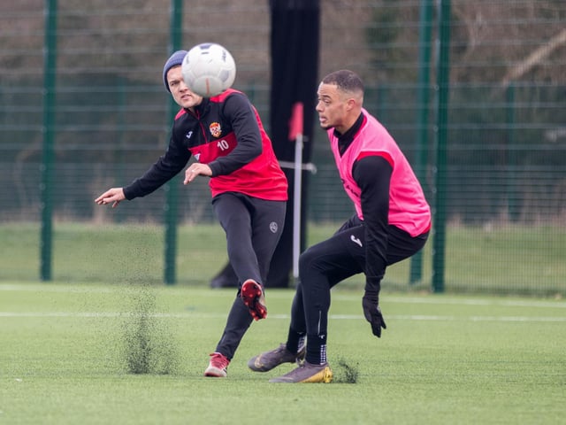 Ben Milnes and Tre Mitford in action