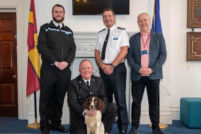 PD Alfie with his handler PC Ian McDonald, Sgt Chris Monday, Chief Constable Nick Adderley and Northamptonshire police, fire and crime commissioner Stephen Mold. Photo: Northamptonshire Police