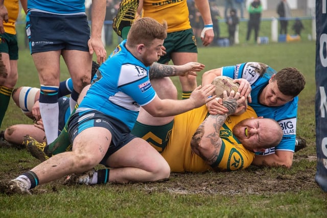 Featherstone Lions' Josh Maden and George Nuttall bring down Jamie Fields inches from the line in the Betfred Challenge Cup first round tie against Hunslet Club Parkside. Picture: Jonathan Buck